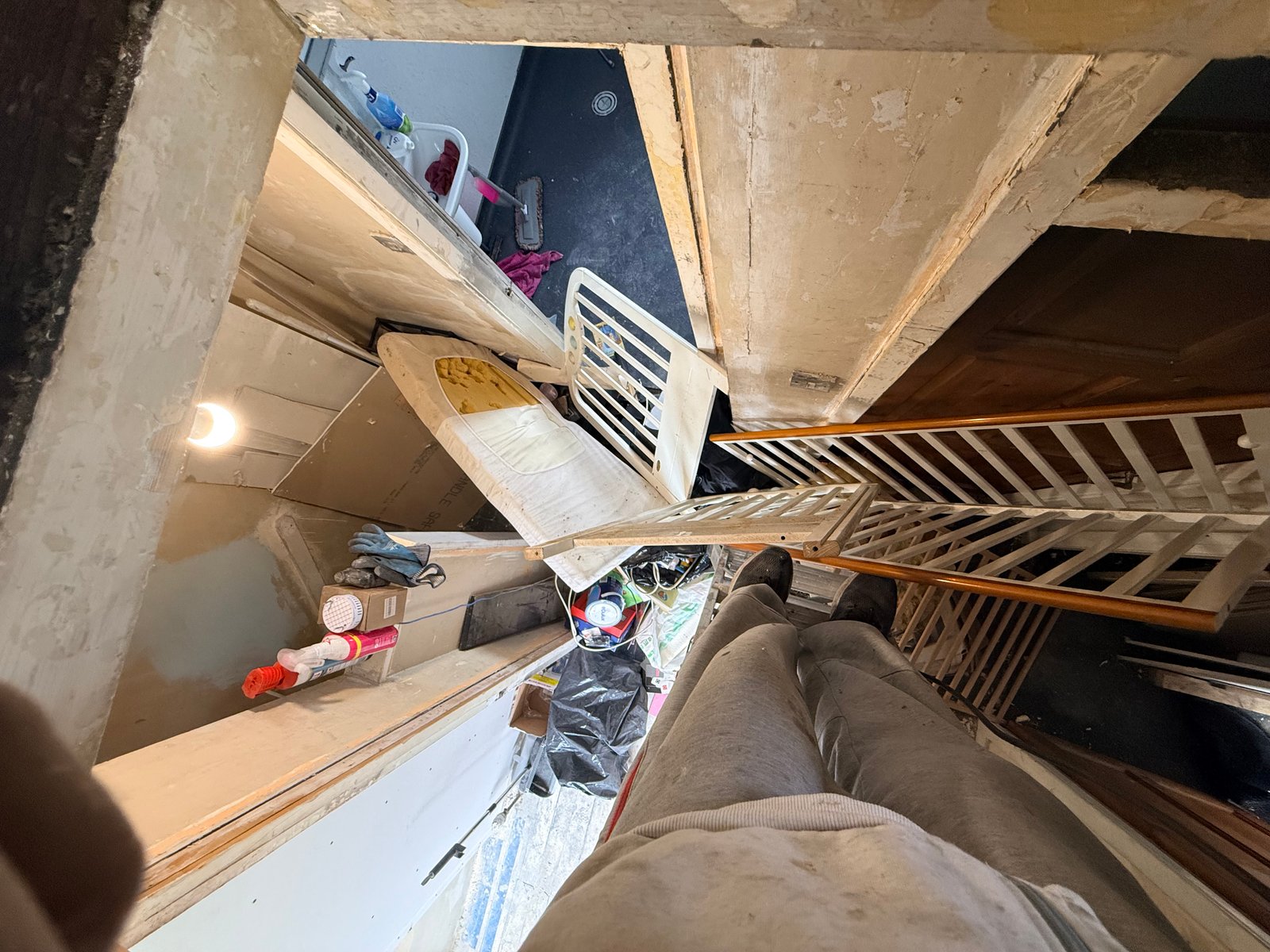 Looking down the ladder at the debris pile